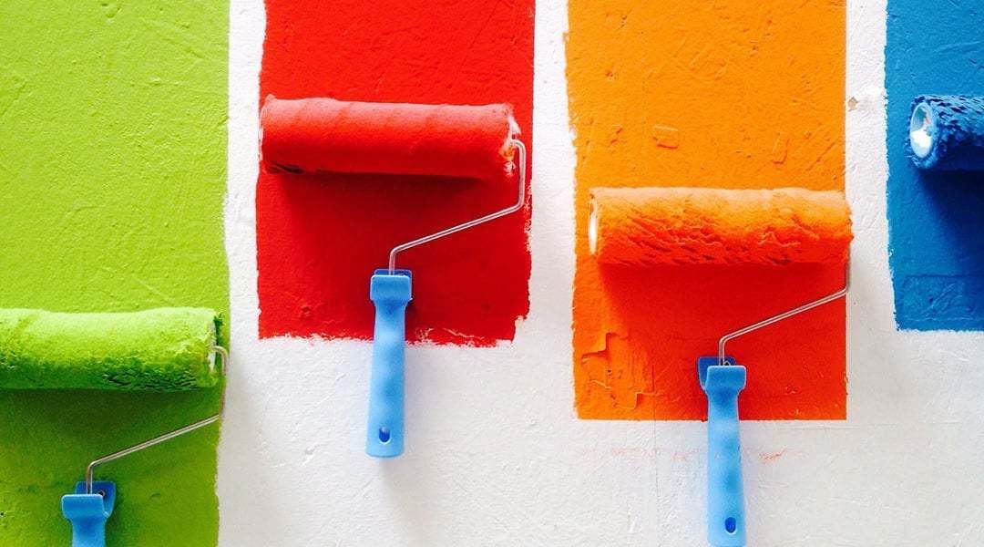 Paint Rollers in Green, Red, Orange and Blue