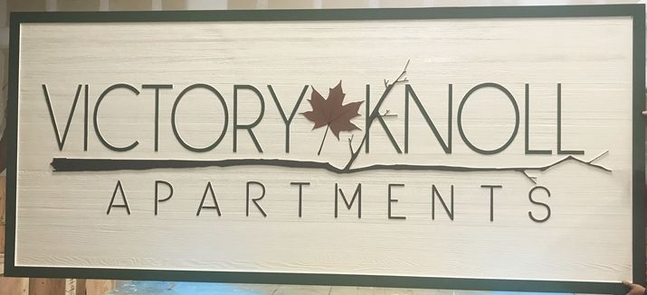 K20112 - Carved Western Red Cedar entrance sign for the Victory Knoll Apartments, with Maple Leaf as Artwork