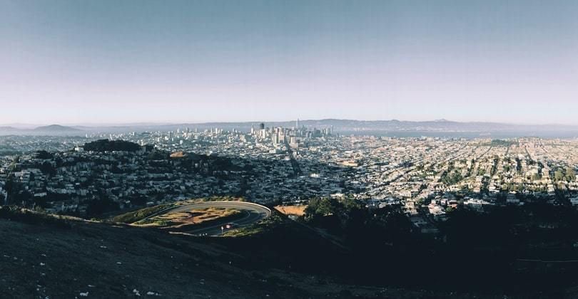 An aerial view of a large city and landscape