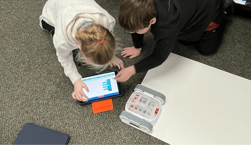 Students using Sphero robots in the classroom