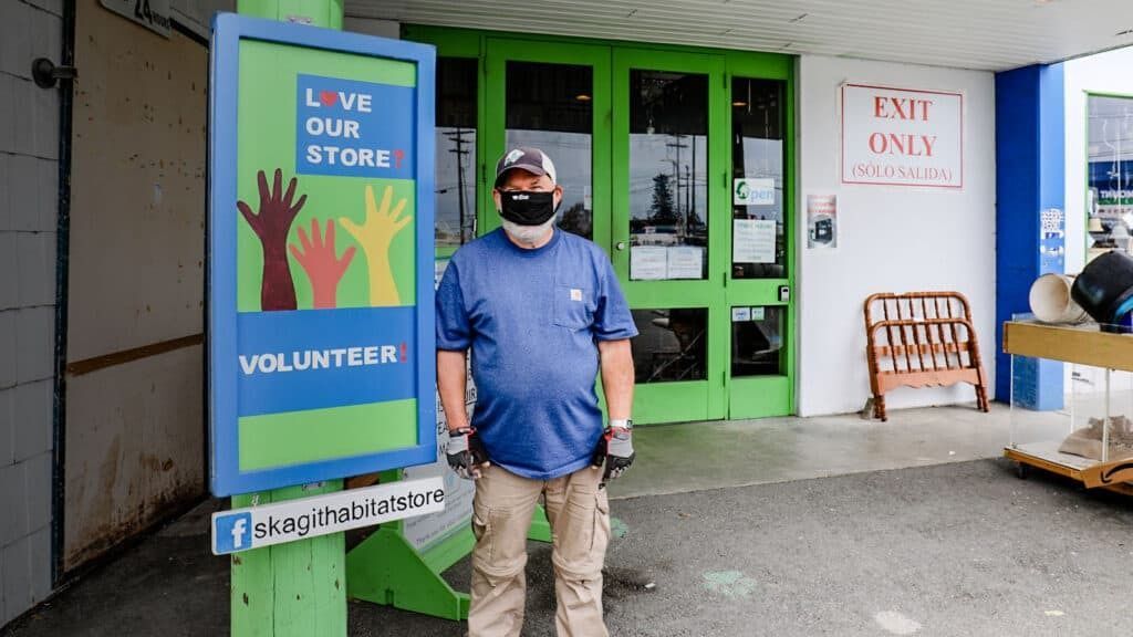 Store Volunteer standing outside the Skagit Habitat Store.