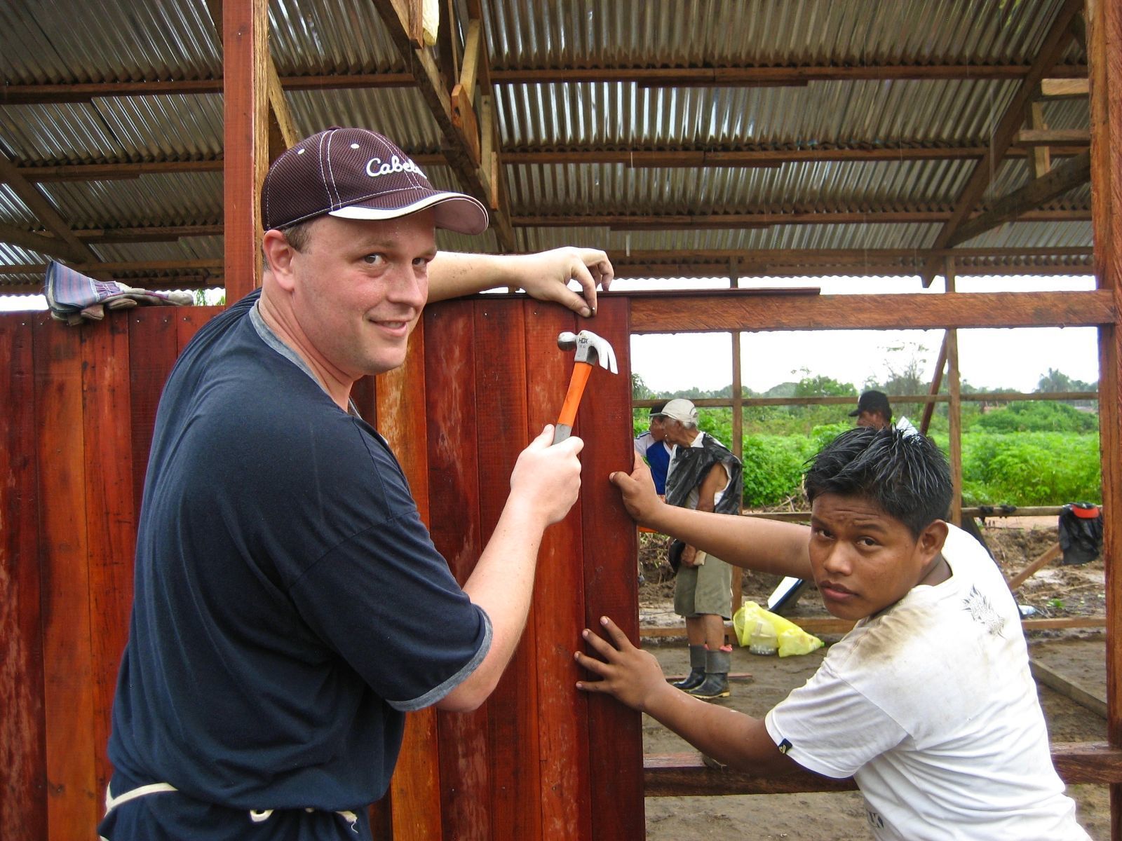 volunteers building