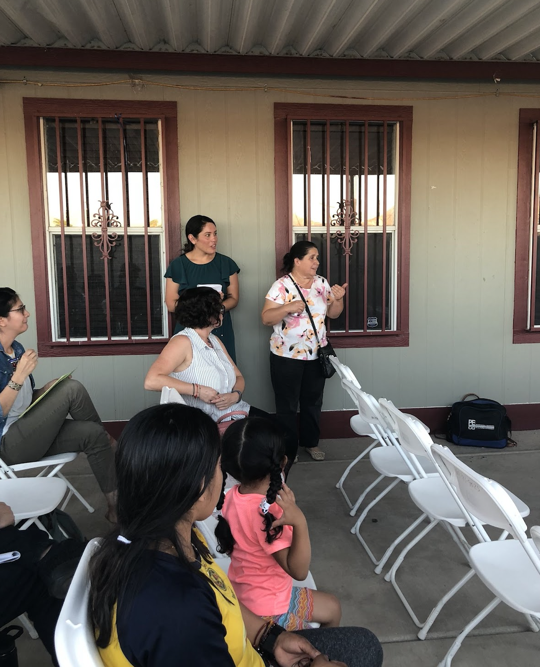 Violeta speaking at a North Shore community meeting