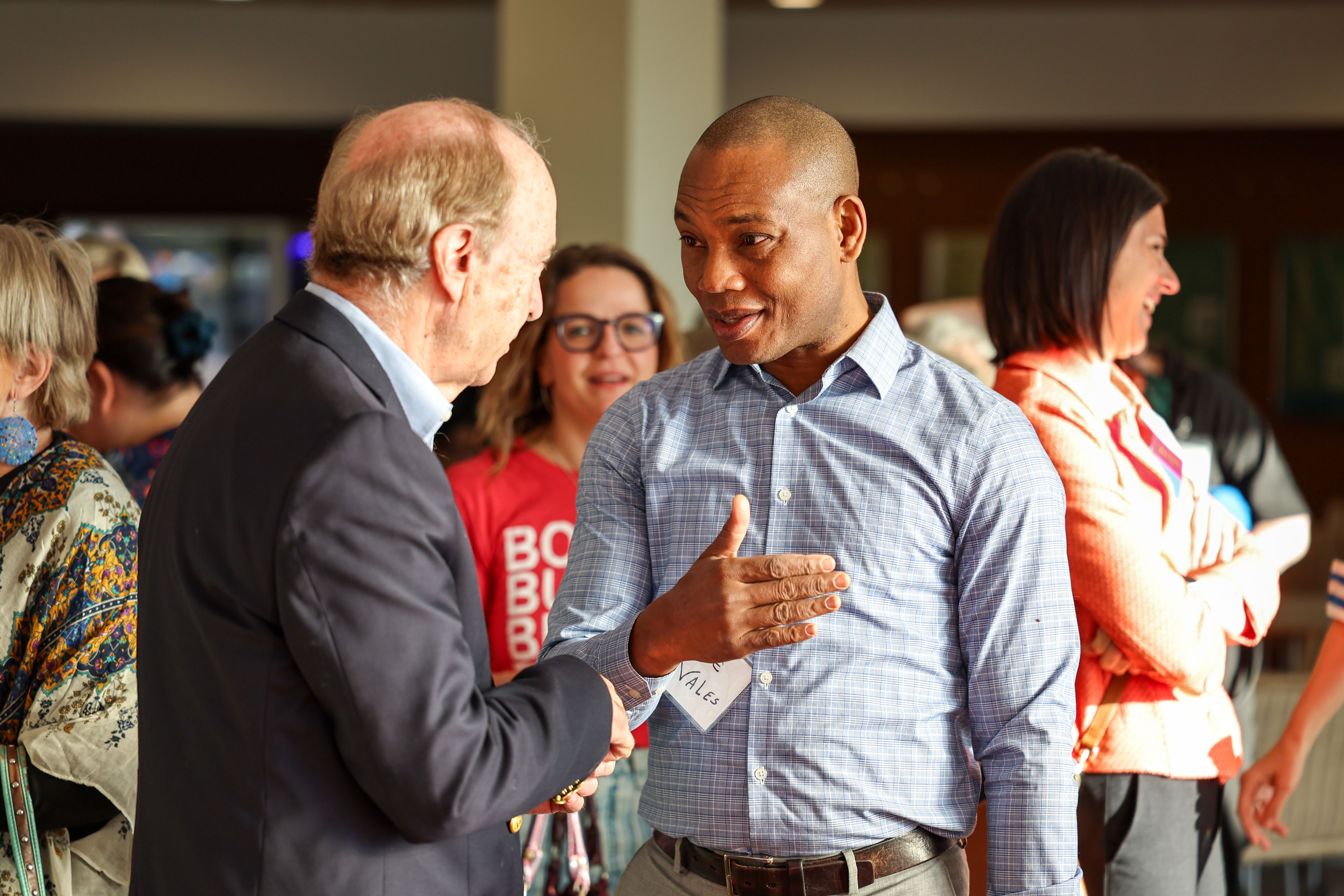 Woman smiles at podium