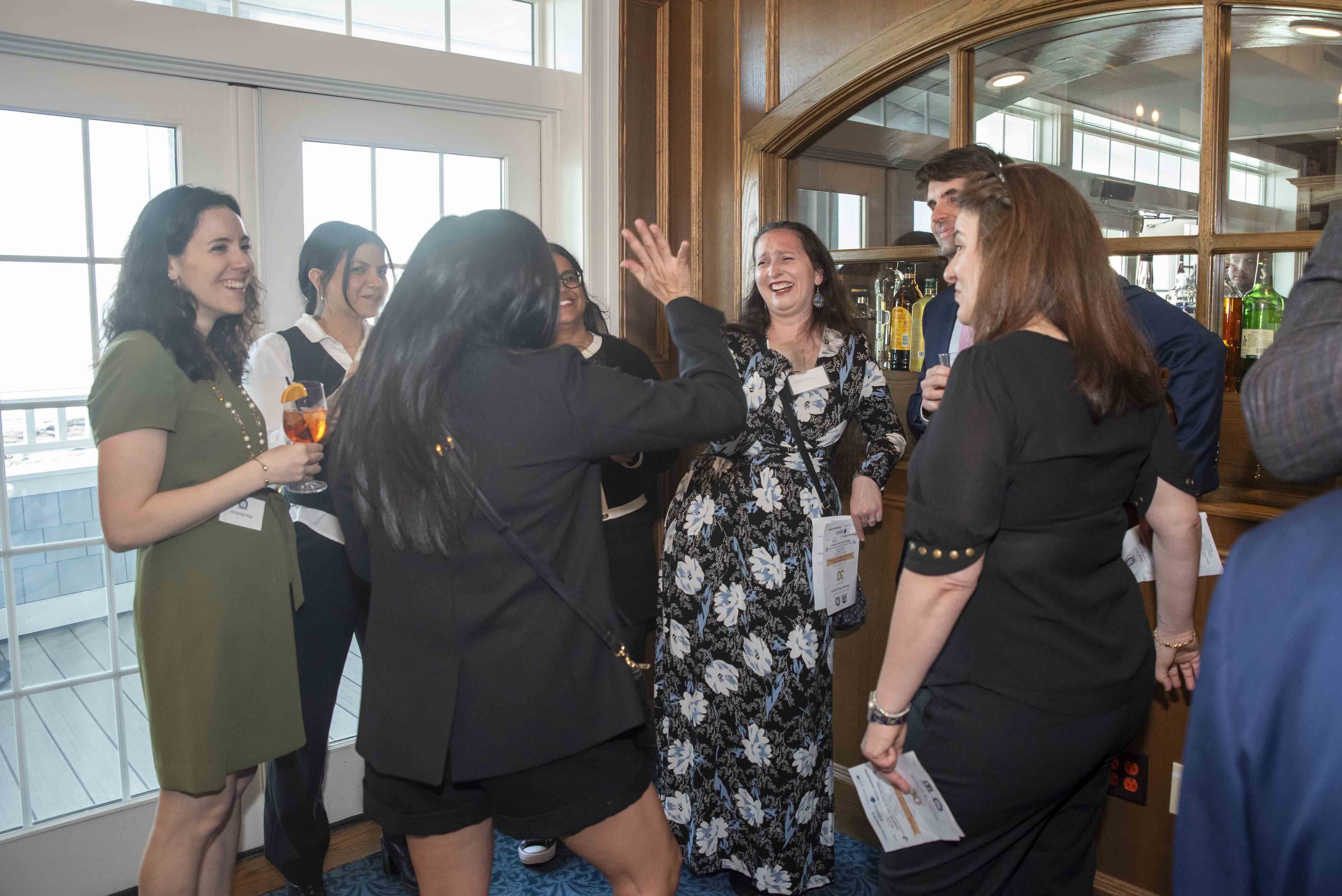 Fellows members chatting at the start of the Reception