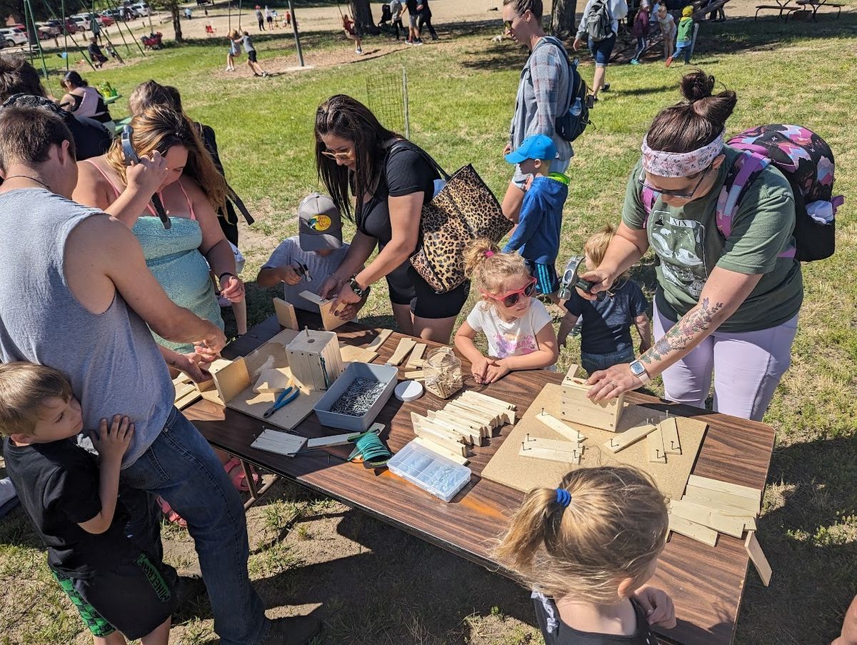 Building take-home bird feeders at the Family Wilderness event