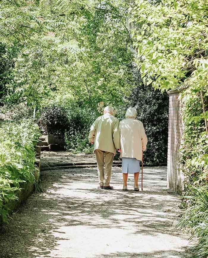 Elderly couple walking.