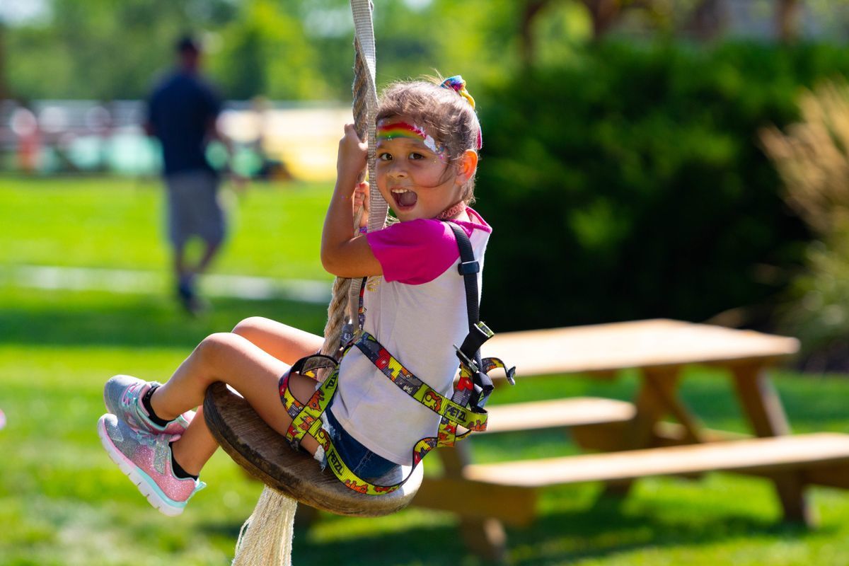 Child on a rope swing