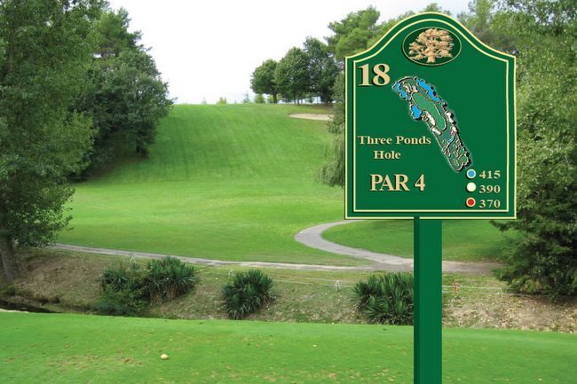 M4714 - Cedar Wood  4" x 4"  Post Supporting a HDU Golf Tee Sign.
