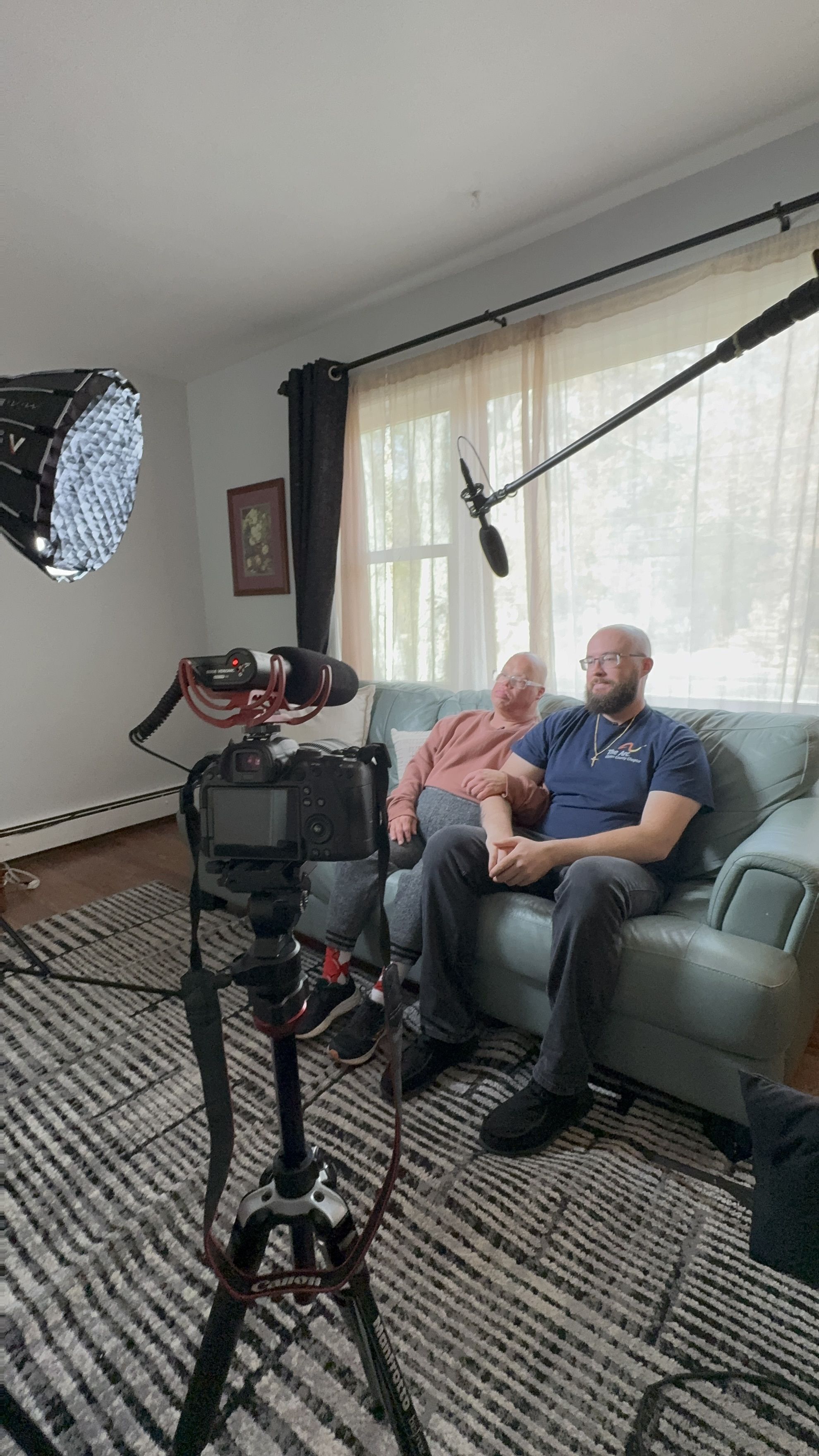 Group home resident and staff being interviewed 