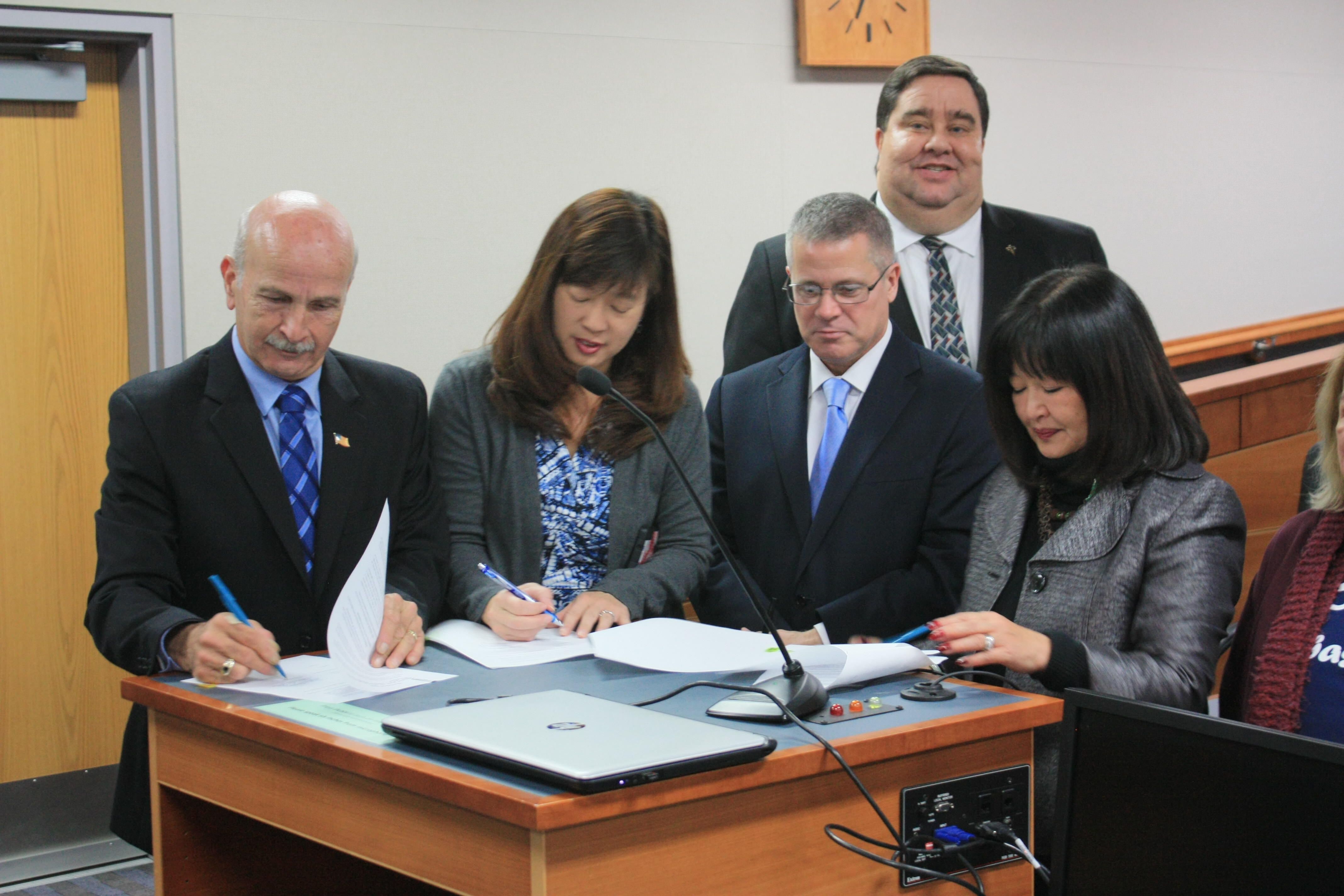 Mayor and Council Signing the Charter