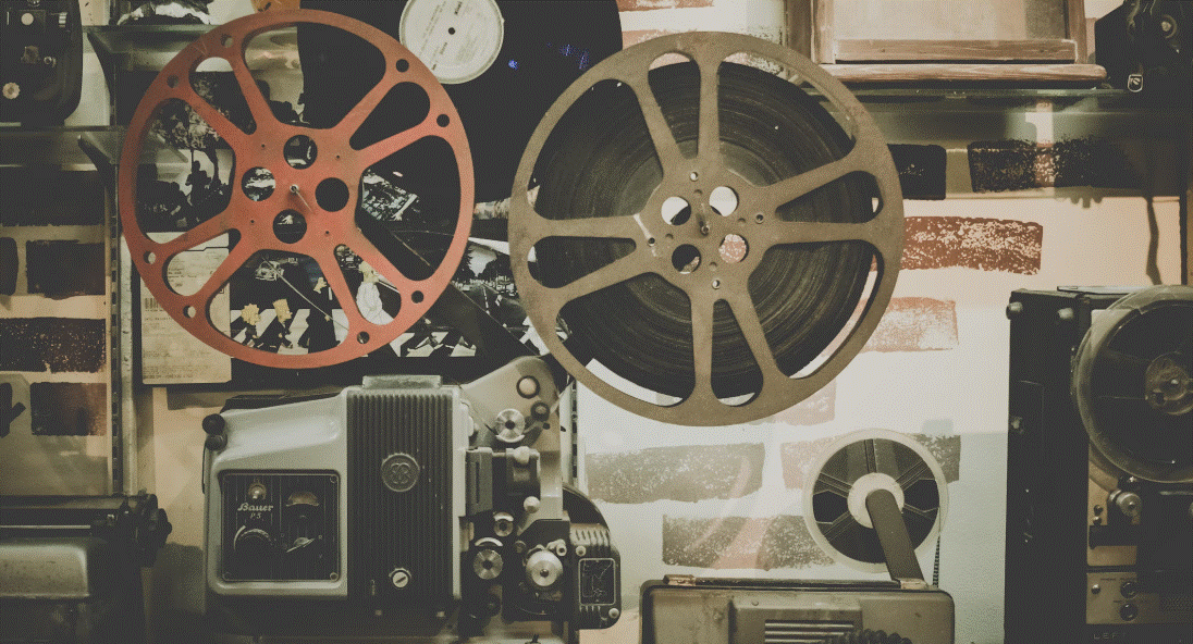 Nostalgic image of old film projector indicating the page has videos on it.