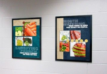 2 food posters in school hallway, food pictures, flip open frames, nutrition education