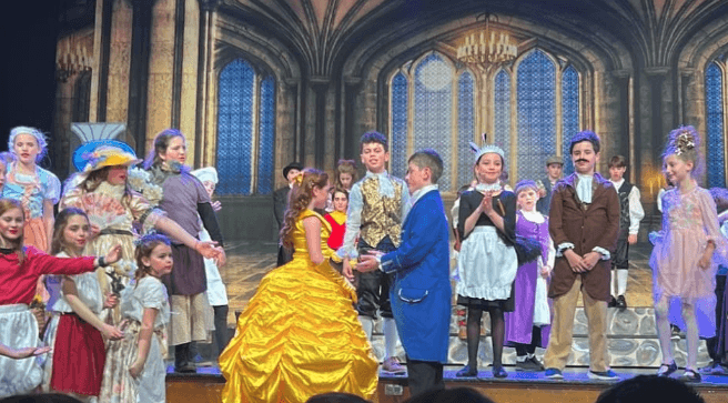 students performing Beauty and the Beast