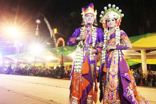a couple from indonesia wearing national costumes