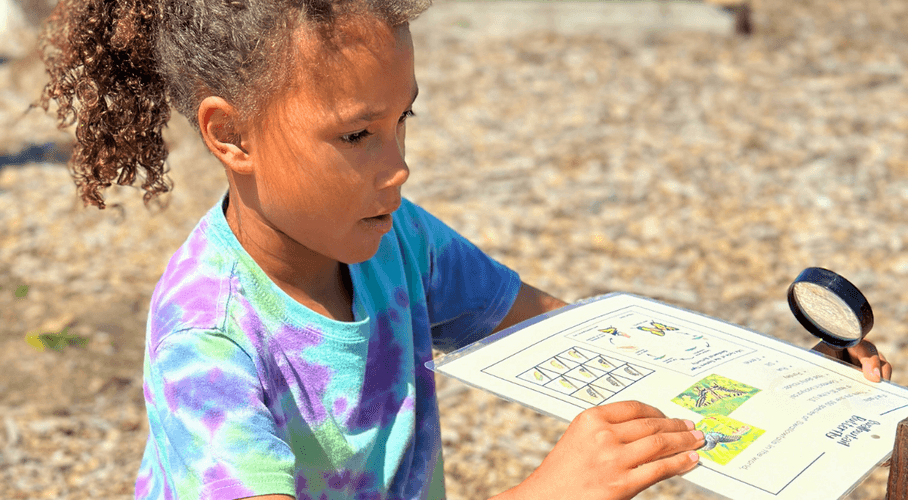 Young girl playing outside