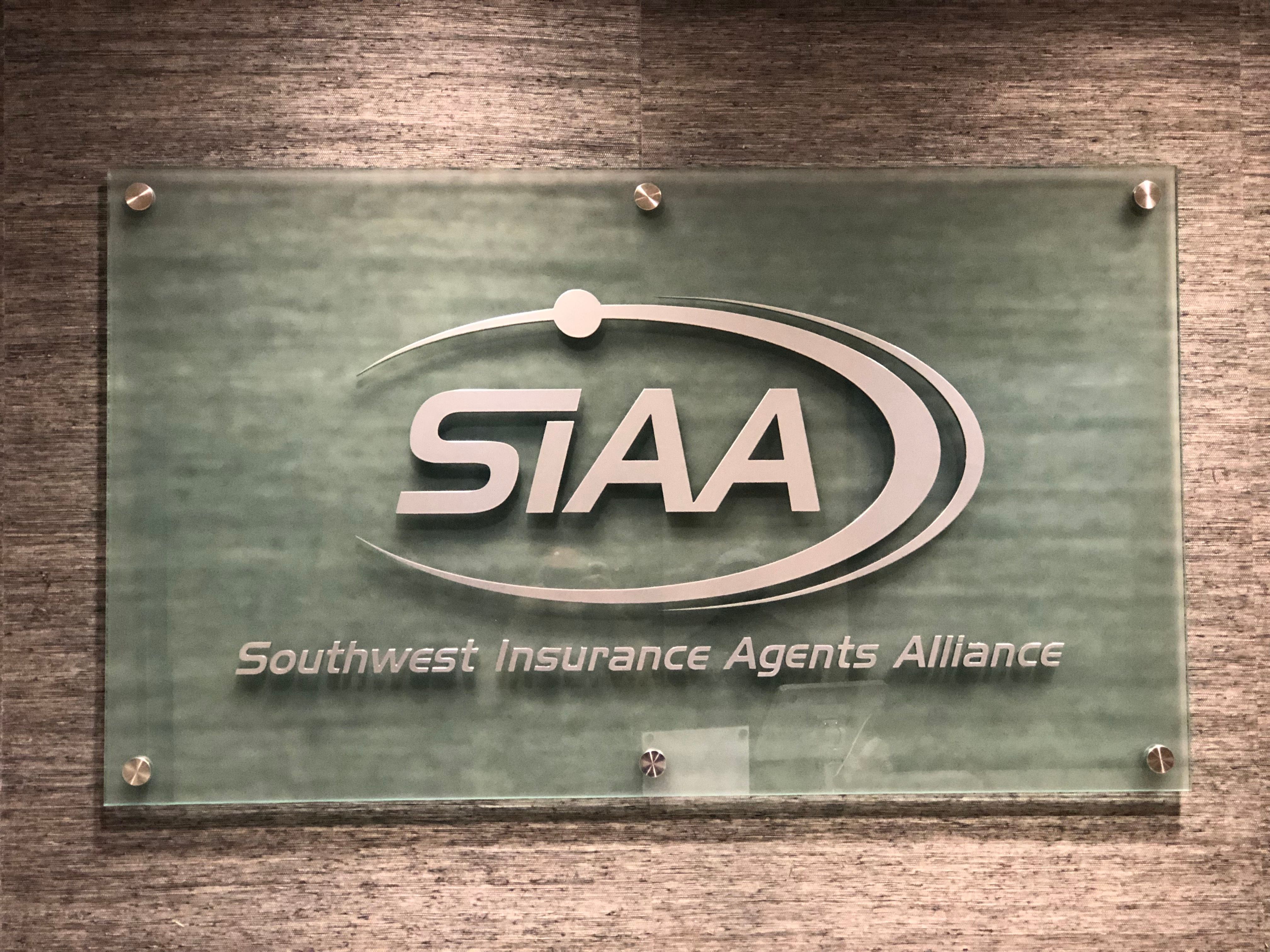 SIAA Glass Lobby Logo