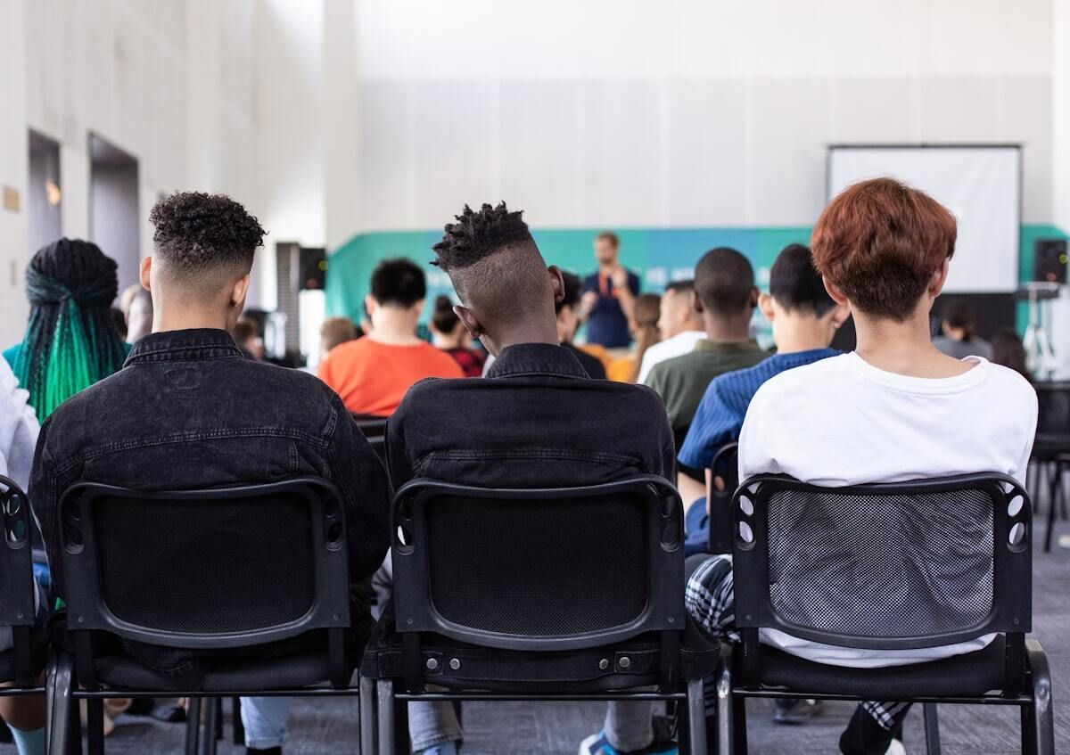 view of students in classroom from behind them