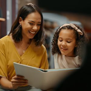 woman and girl reading