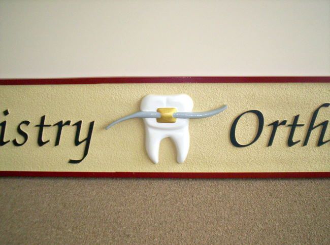 BA11631 – Details of Orthodontics Sign with Carved Molar and Retainer Wire