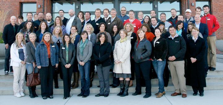 A group of people posing for a group photo