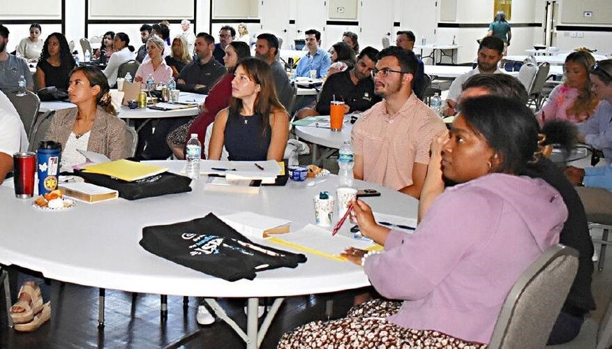 Engaged couples listen to Deacon Louis Romero’s instruction at the Diocese of Palm Beach's marriage preparation