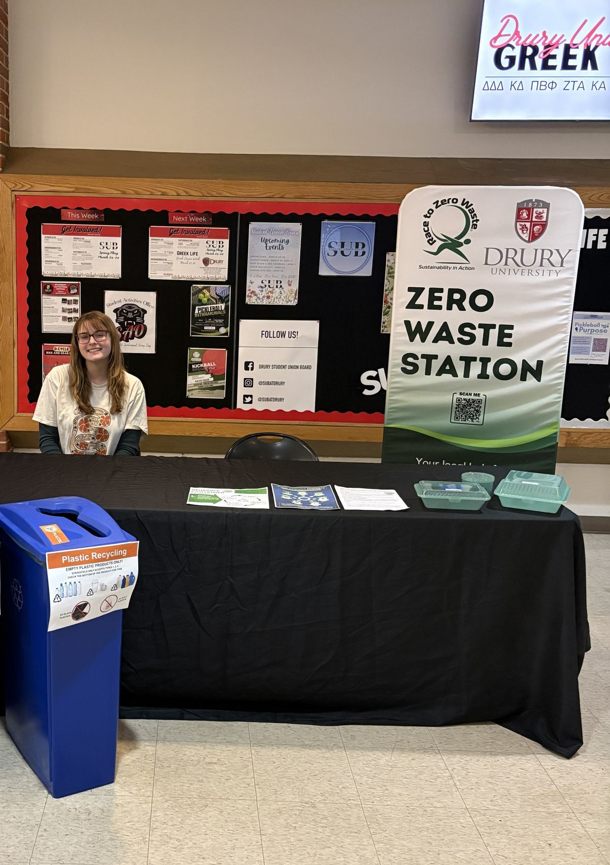 a Drury University student at the Zero Waste Station