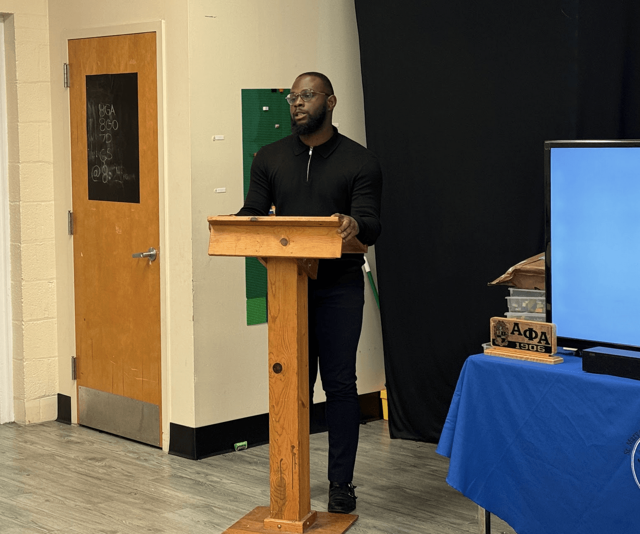 May 2024 STEAM Teacher Mr. Derrick Harrell at the NCF Ambassador Completion Ceremony at St. Mary of the Mills