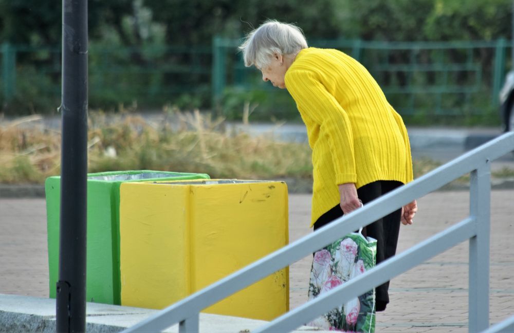 Woman with hunched back, a preventable and treatable condition that many cannot afford to treat.