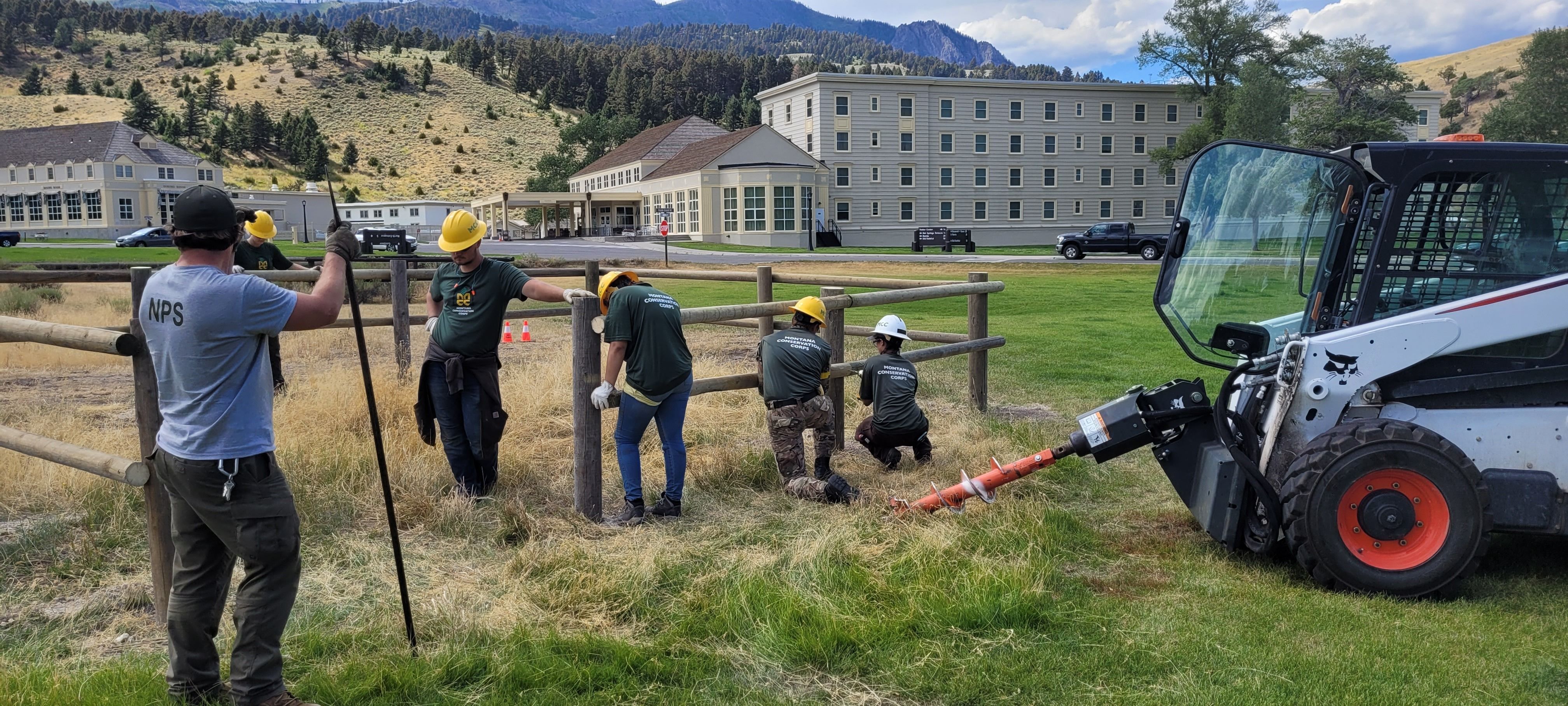 A youth crew repairs a fence in Mammoth in Yellowstone National Park.