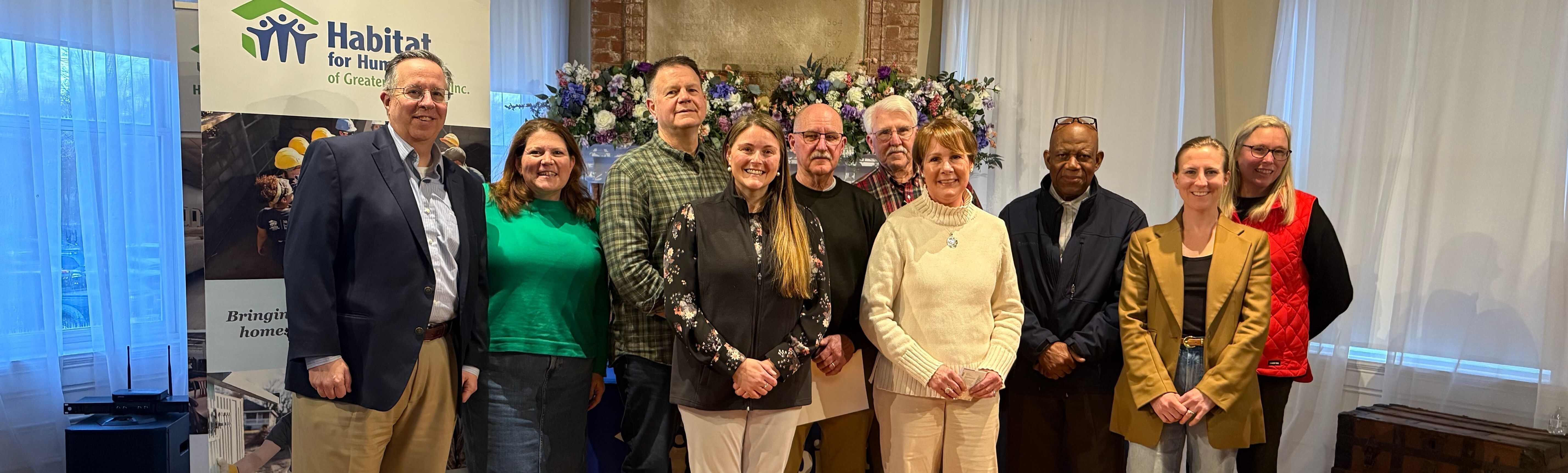 Photo of 10 men & women from the HFHGP Board of Directors