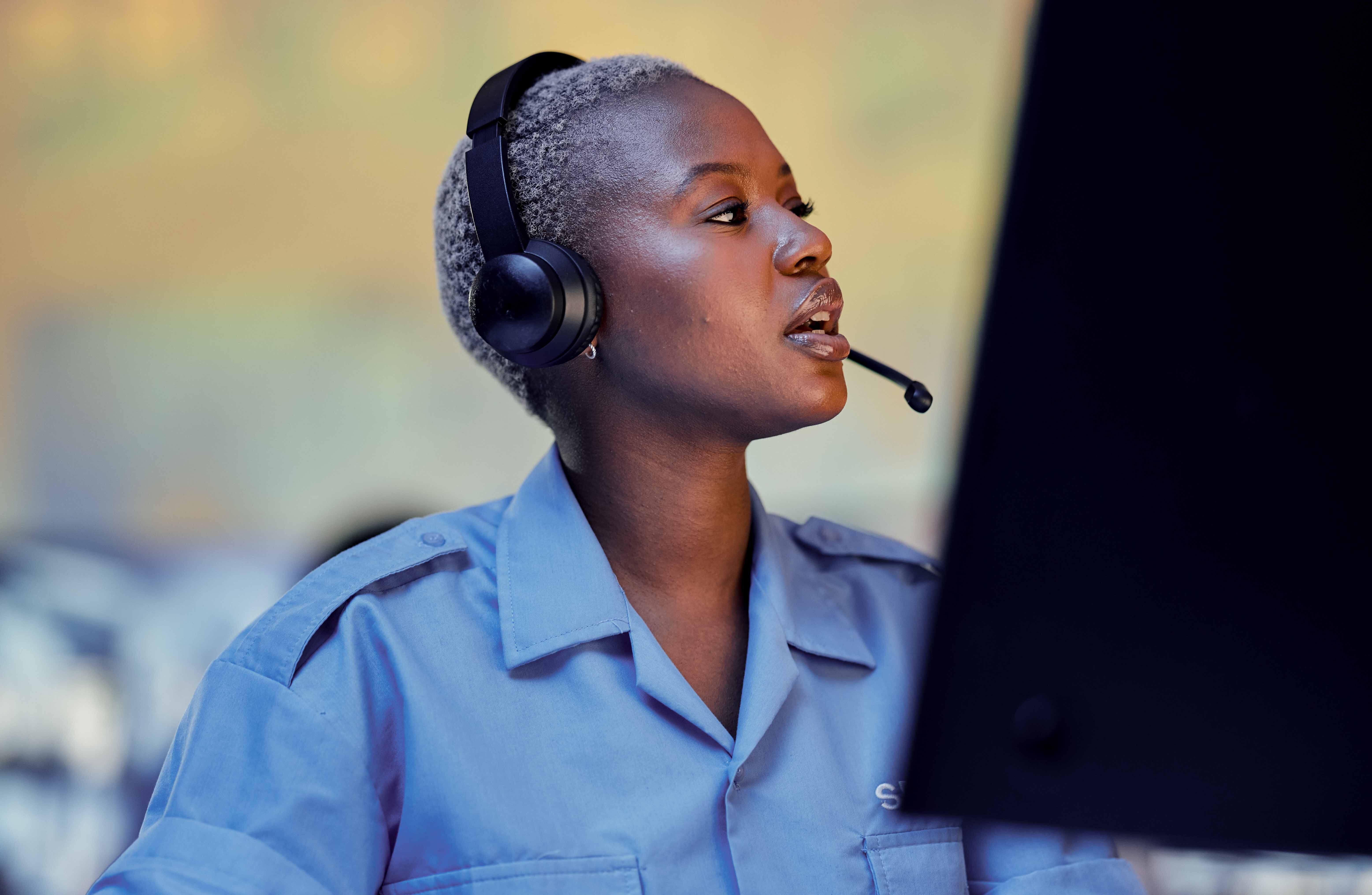 call center workers with headsets