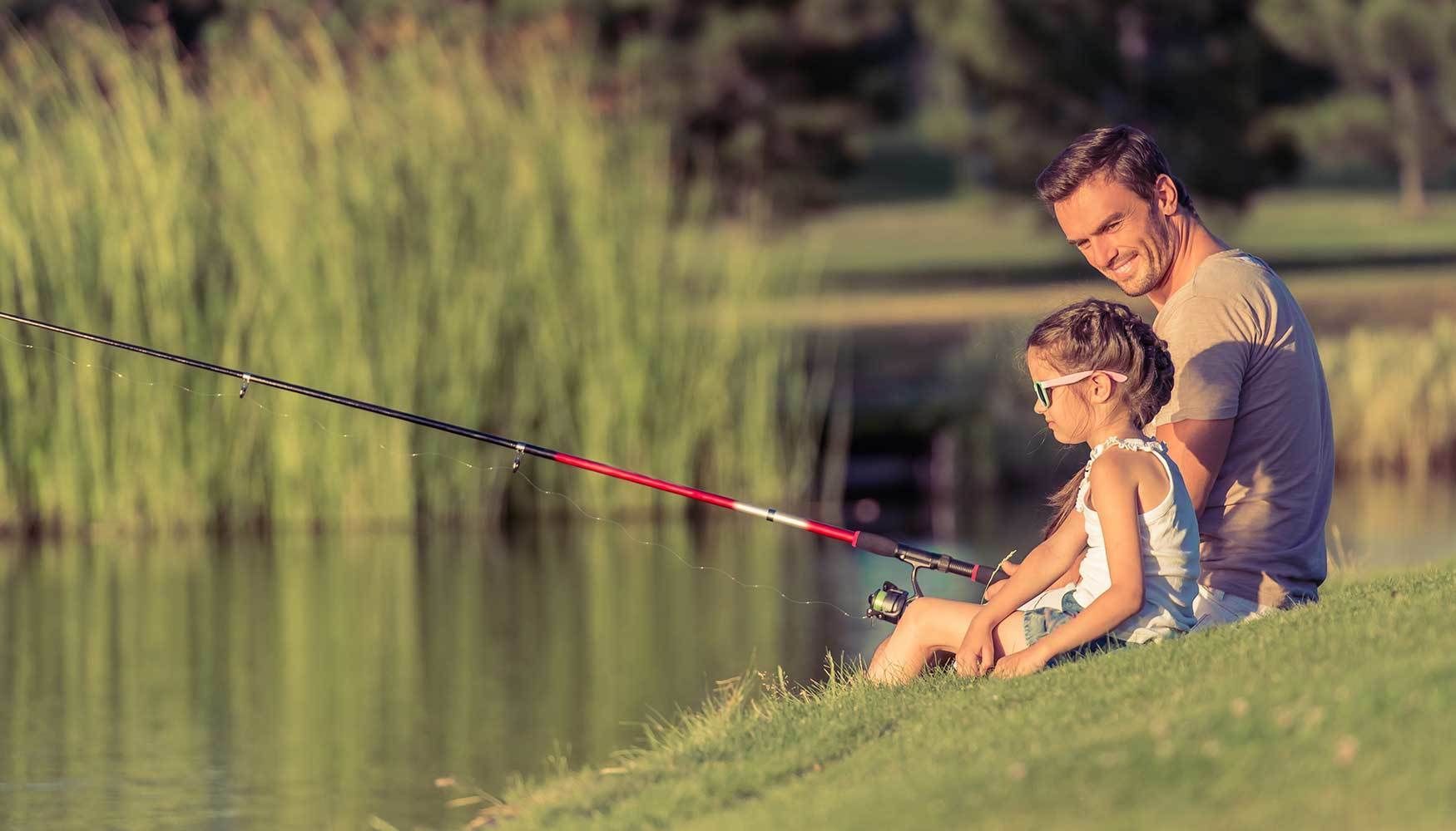 Father and daughter fishing.