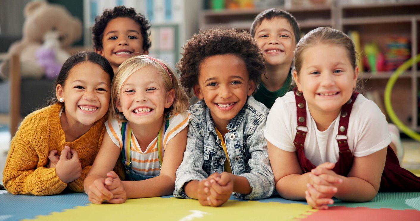 children of different ethnicities smiling