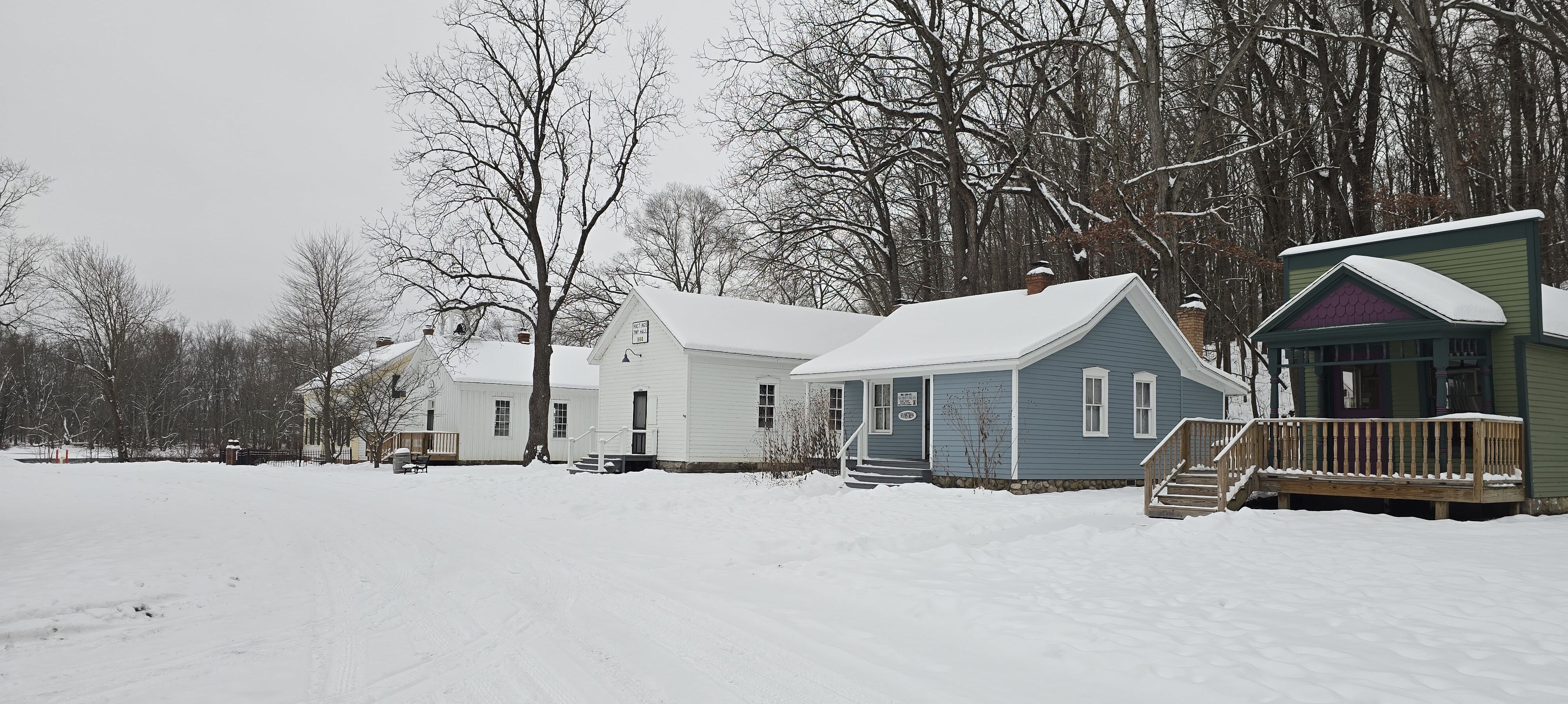 Image of historic buildings covered in snow.