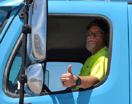Delivery driver giving thumbs up.