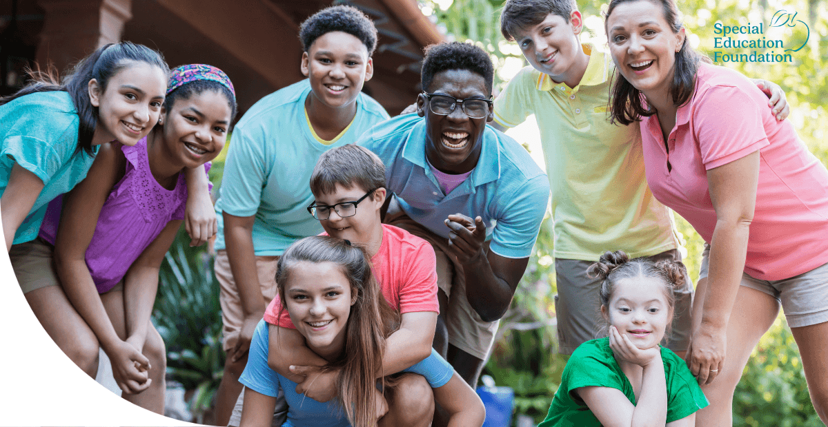 boys and girls all bunched together at a camp