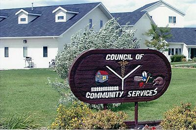 Old Council of Community Services sign.