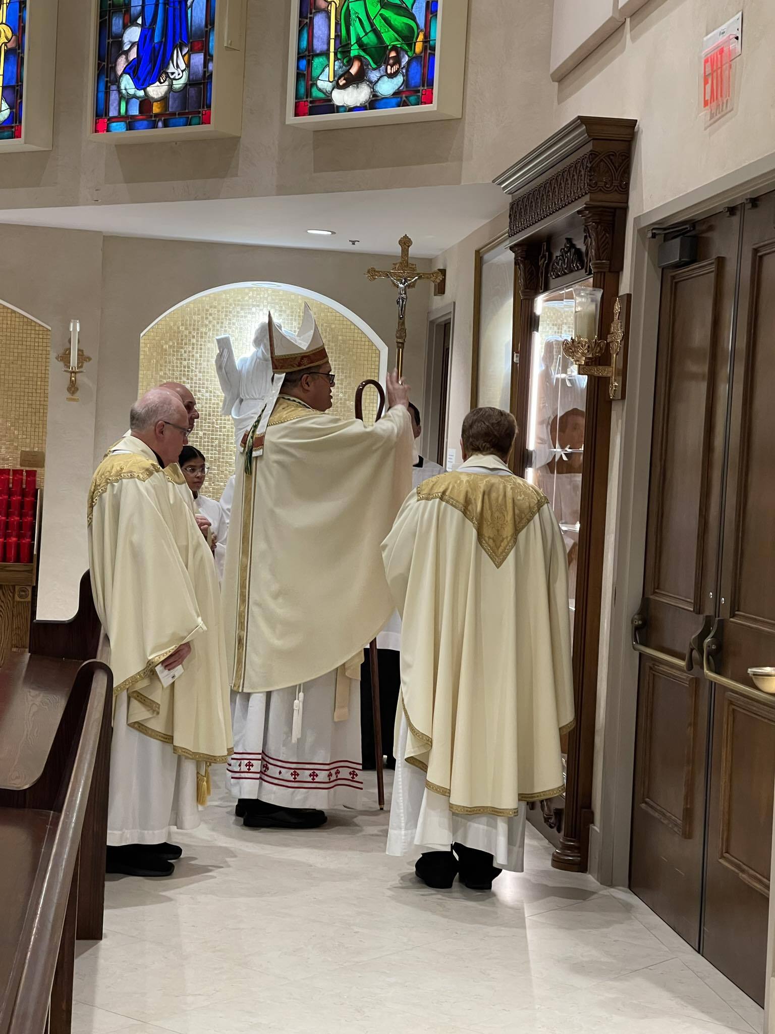 Bishop Manuel offers a blessing at St. Andrew Parish