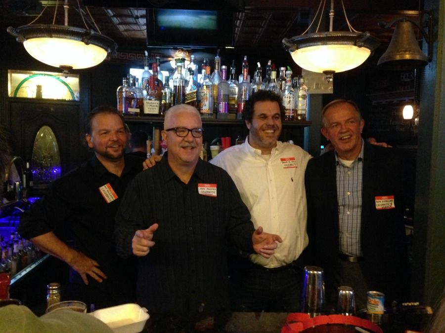 Local celebrities Pat McClosky, John Ralston, David M. Hall, and Mayor Ron Strouse bartend at Celebrity Bartender fundraiser event.