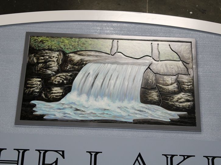 M22418 -  Closeup of  Carved Property and address name sign "The Lakes at Lemmon Valley"  with  Waterfall as Artwork