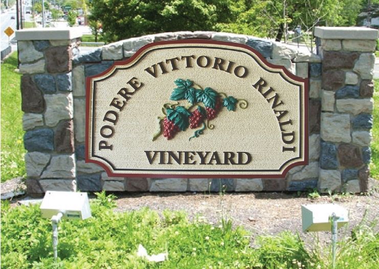 M6725 -  Vineyard Monument with a Faux Rock Facade and a Carved 3D Sign with Grape Clusters