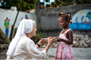 Felician Mission in Haiti Sr. Marilyn with Child