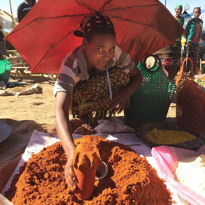 Aster, selling her spicy berbere in the Angecha market