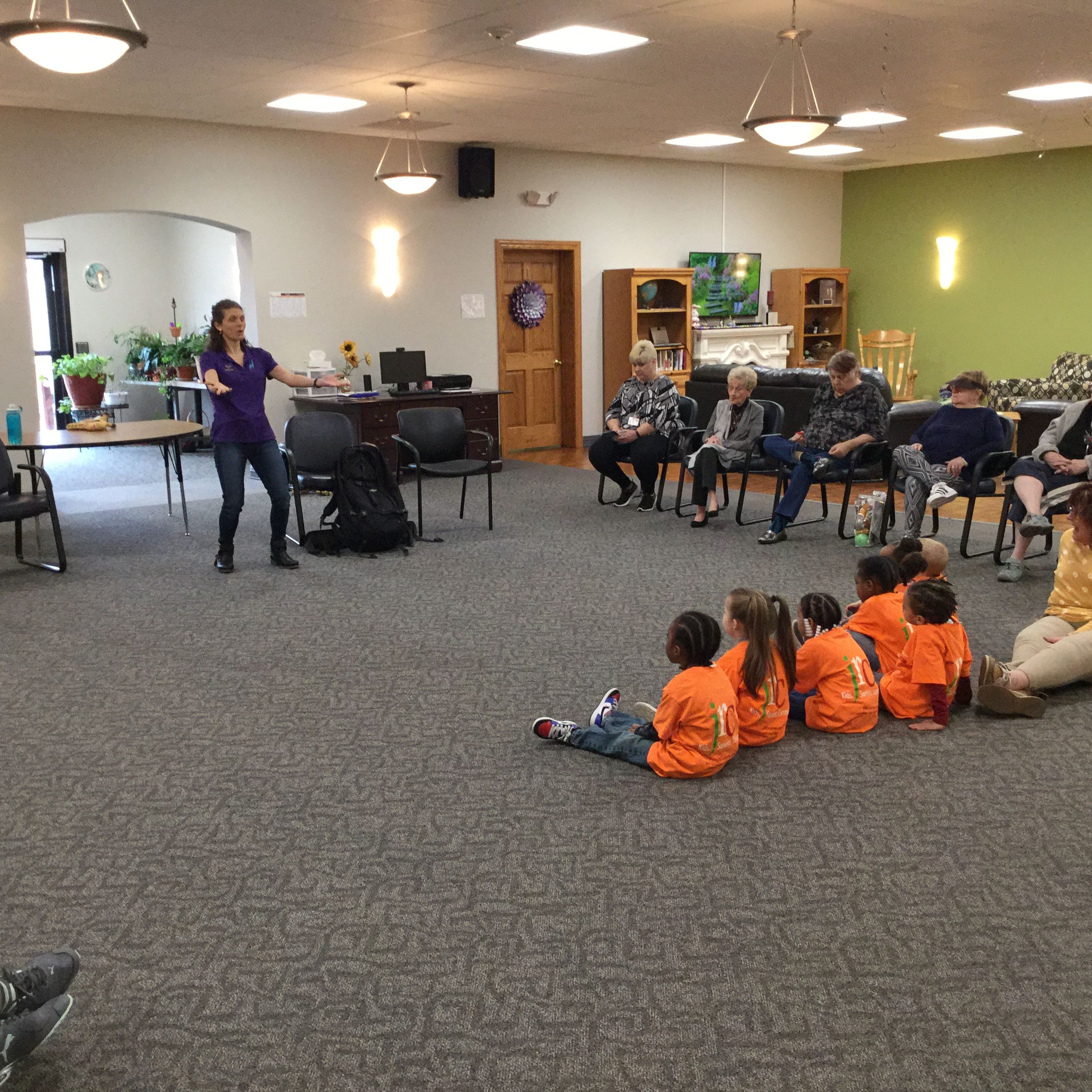 Lindsay Bonilla, Storyteller and Author describes the Intergenerational Connections Program of Storytelling for the day as she chooses her actors from both the children and senior/members.  The balance of the group will be asked to actively participate.