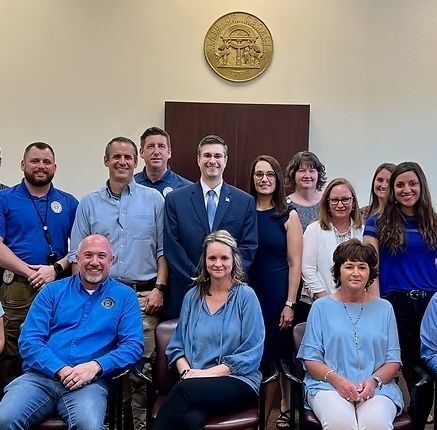 The Circuit Court for Frederick County, MD Seal – A colorful emblem featuring Lady Justice standing beside a ship and trade goods, symbolizing law, commerce, and maritime heritage within the jurisdiction of Frederick County, Maryland.