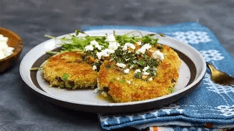 Curried potato cakes with spicy cilantro chutney