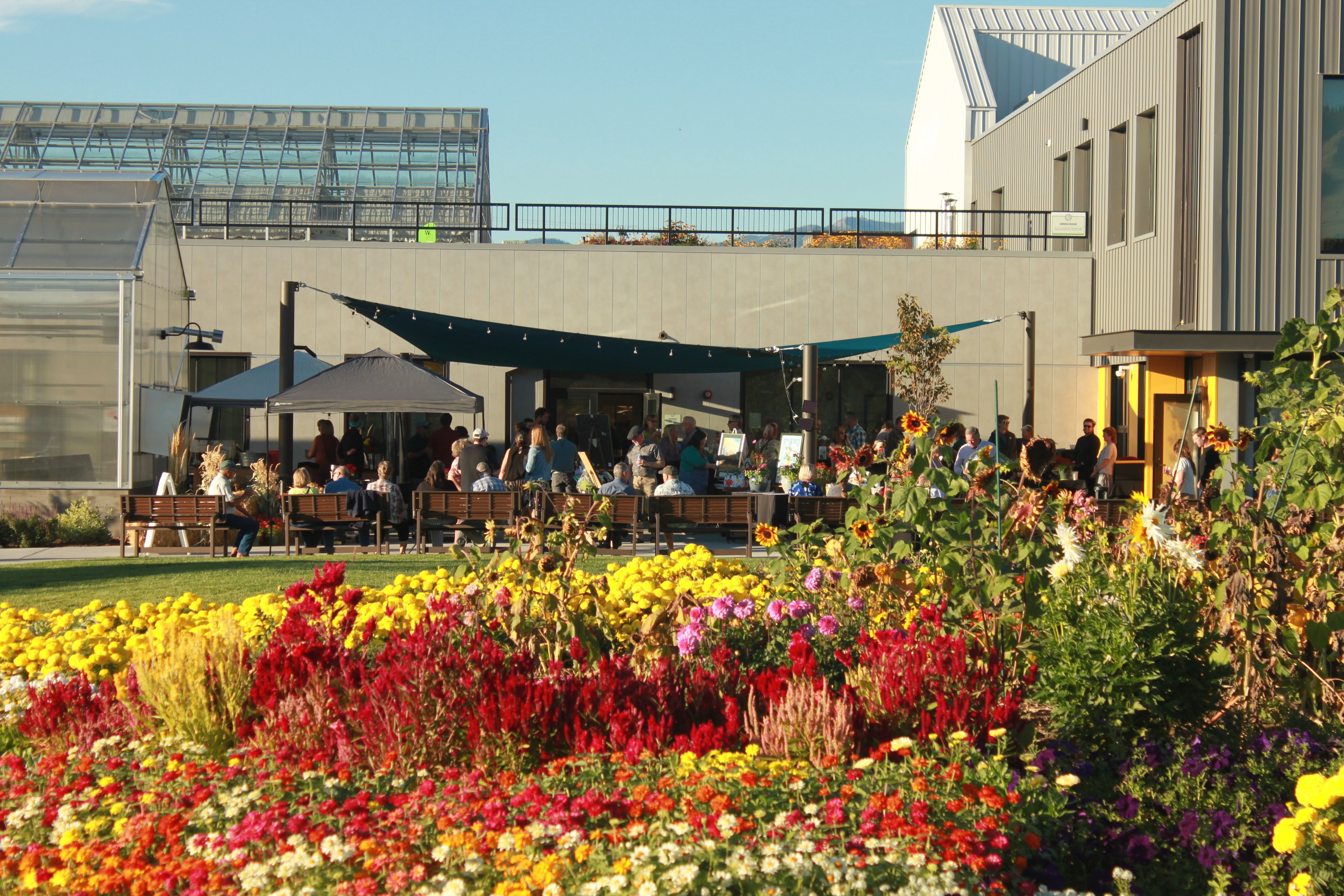 Annual Fall Fundraising event, Rocky Mountain Gardens outside display with flowers in the foreground.