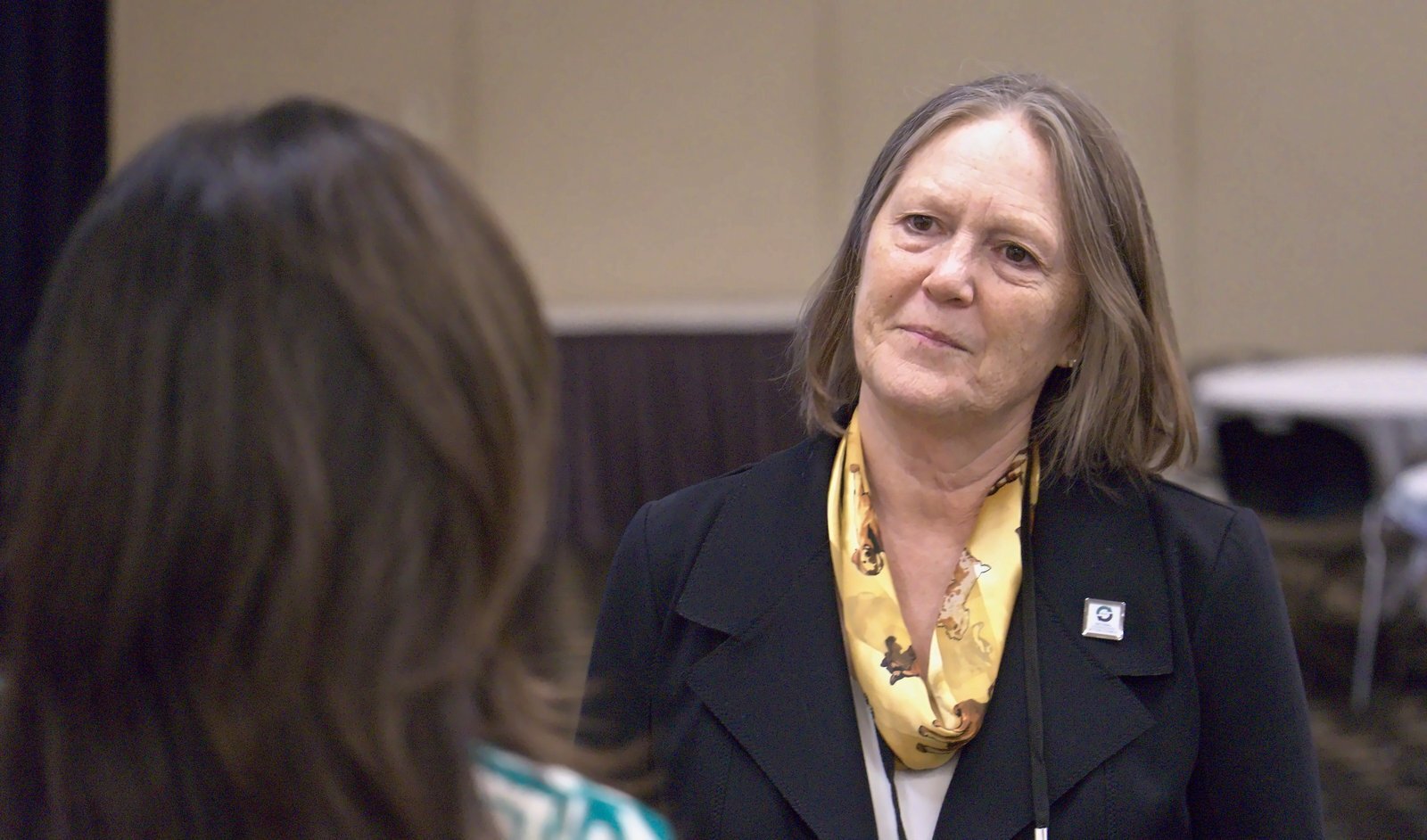 Heidi Sanborn in conversation with an attendee at NRC’s Circularity Forum.