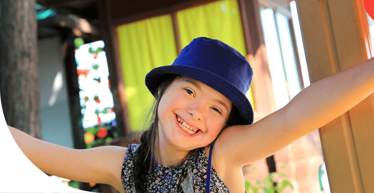 smiling girl in a hat 